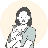 猫を抱えた女性医者のイラスト